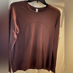 Women’s Lululemon long sleeve shirt. Size 8.